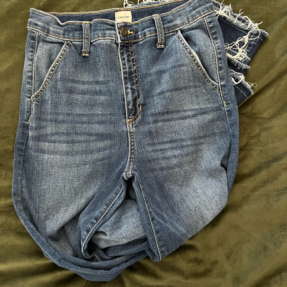 Sneak Peak medium/dark raw hem flare jeans